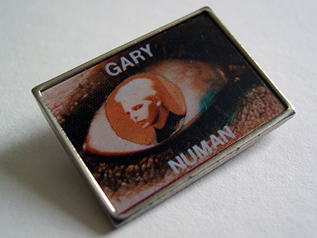 Gary Numan metal 'Replicas' style lapel badge design