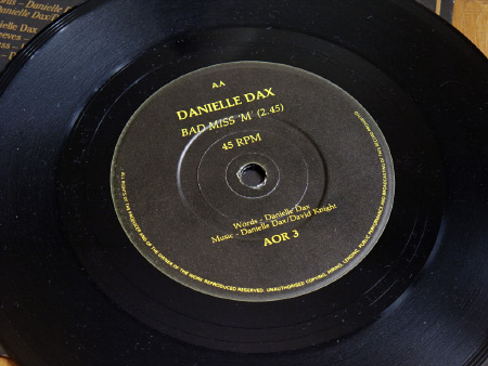 Danielle Dax 'Yummer Yummer Man'/'Bad Miss M' double A side 7 inch single - label design side AA