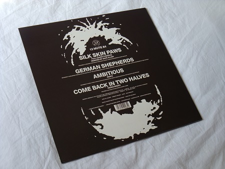 Wire - Silk Skin Paws UK 12" single rear sleeve