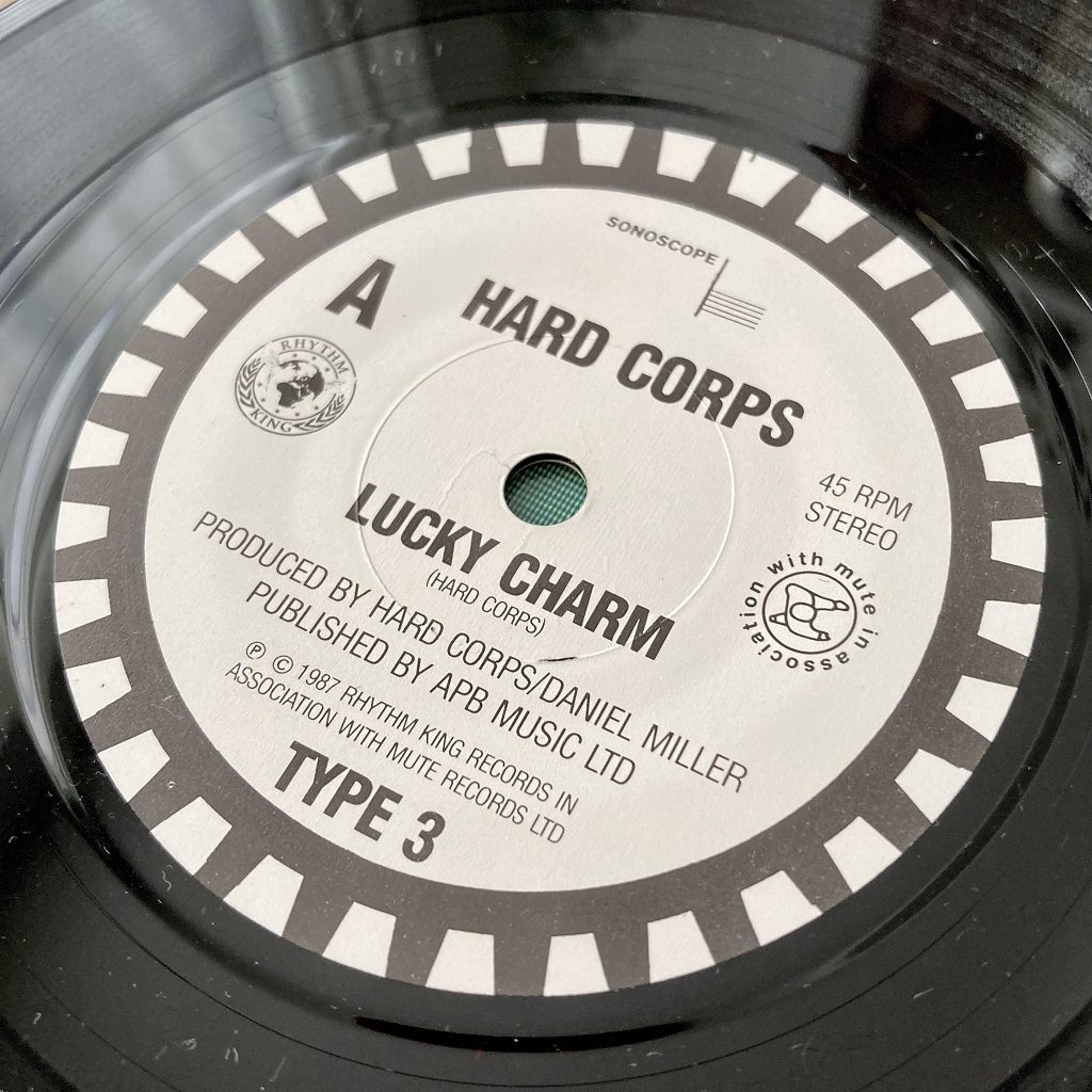 Hard Corps - Lucky Charm UK 7 inch single label A