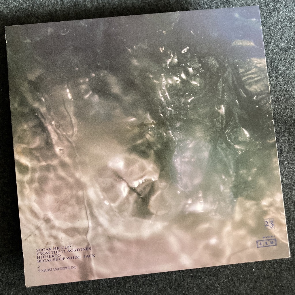 Cocteau Twins 'Sunburst and Snowblind' UK 12" EP rear cover design