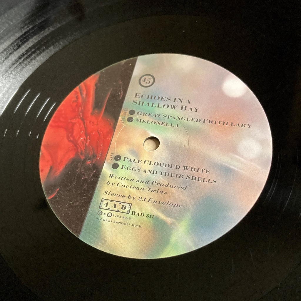 Cocteau Twins - Echoes In A Shallow Bay UK 12" EP label side 1