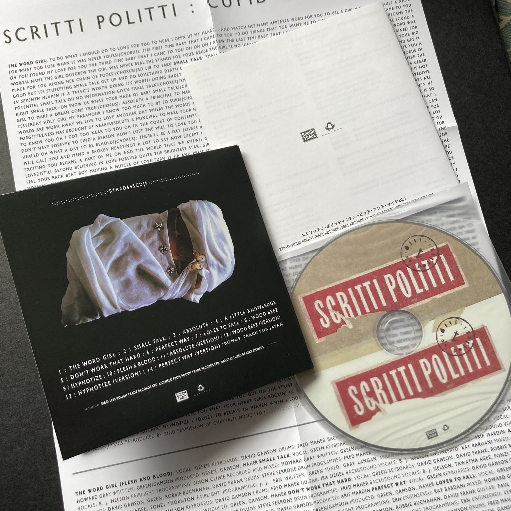 Scritti Politti 'Cupid & Psyche 85' 2022 Japanese re-issue CD - rear cover design, disc label and the two inserts (English language one folded out, back of Japanese language booklet)