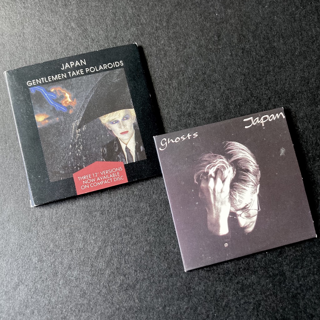 Side by side: 1988 Japan 3” CD singles - 'Gentlemen Take Polaroids' and Ghosts' front cover designs