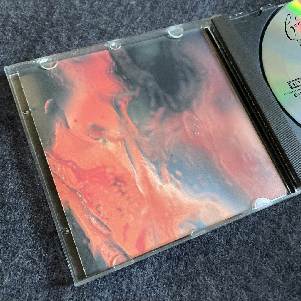 Cocteau Twins 'Tiny Dynamine / Echoes In A Shallow Bay' UK CD insert rear design
