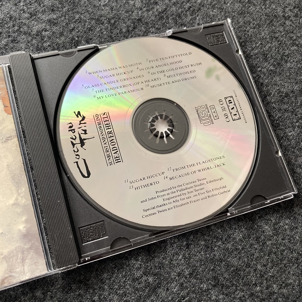 Cocteau Twins - 'Head Over Heels and Sunburst and Snowblind' UK CD disc label design