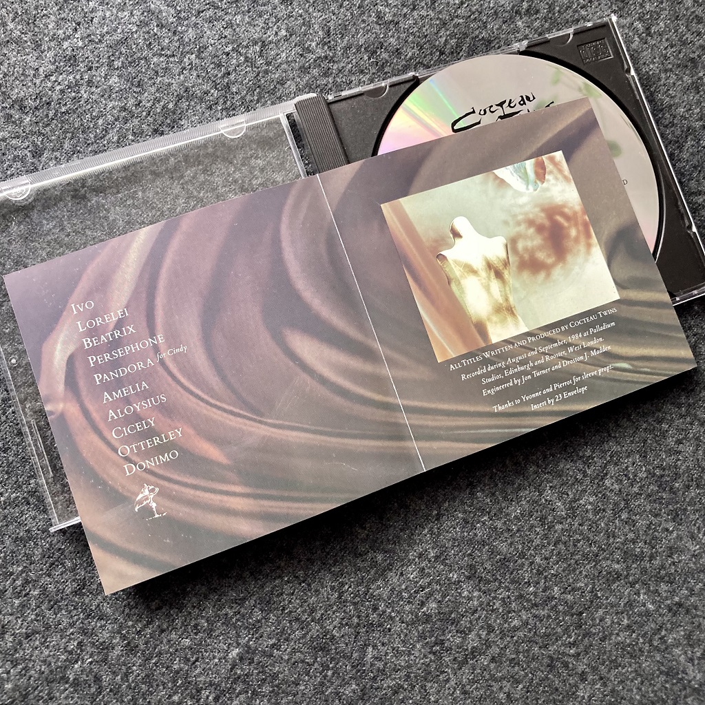 Cocteau Twins - Treasure UK CD insert middle spread design