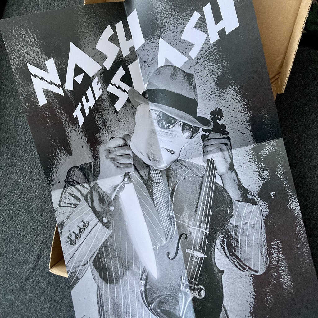 Nash The Slash 'Cut-Throat' book unboxing - poster, unfolded